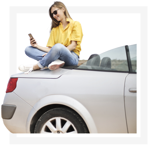 woman sitting on car